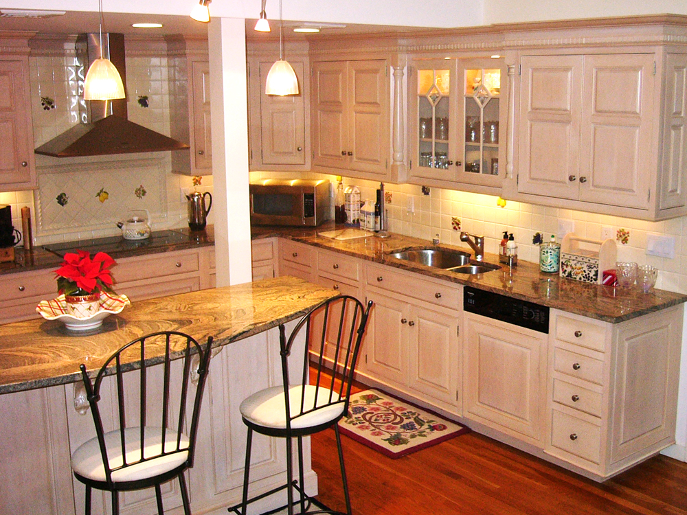 Kitchen in Dover, MA, gold counters, hardwood floors, white counters