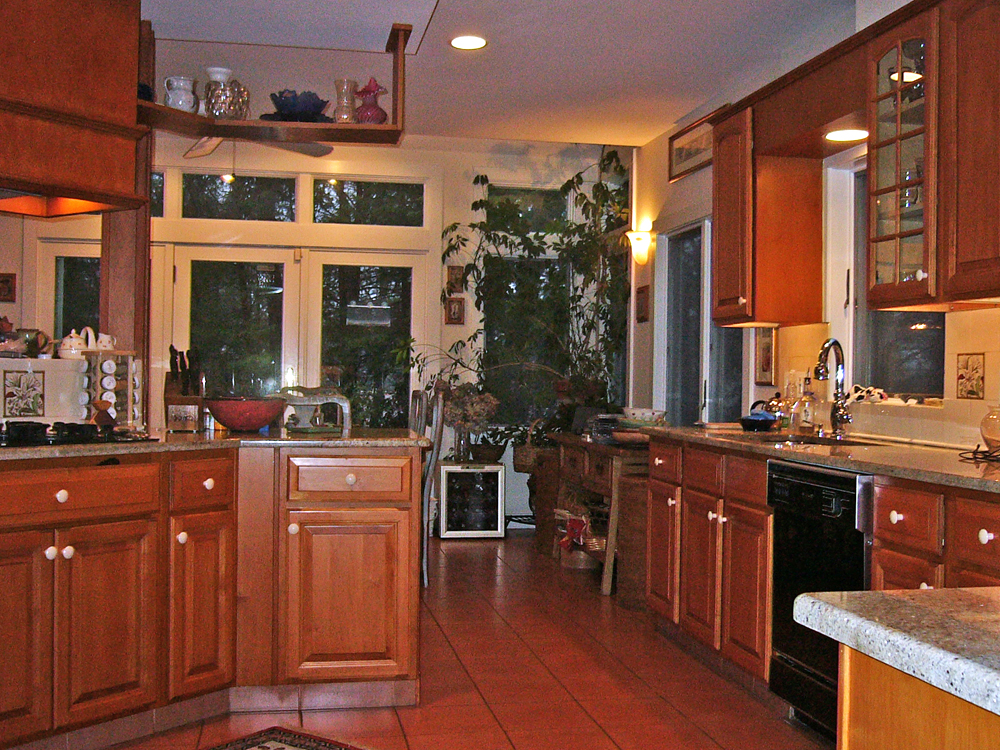 large cherry kitchen with tall hanging shelf