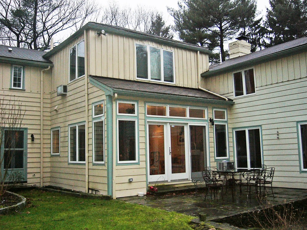 view of back with patio - with outlines of windows